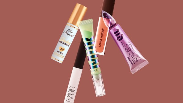 eye shadow primers on brown background